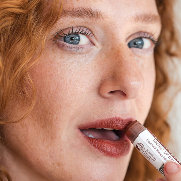 Natural tinted lip balms from Wild Prairie Soap Co. in soft pink and red shades, providing sheer colour and moisturizing lip care